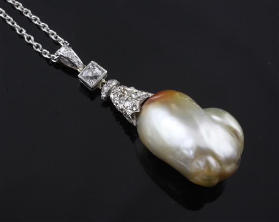 A white gold and rose cut diamond mounted natural salt water baroque pearl pendant, chain 145in.